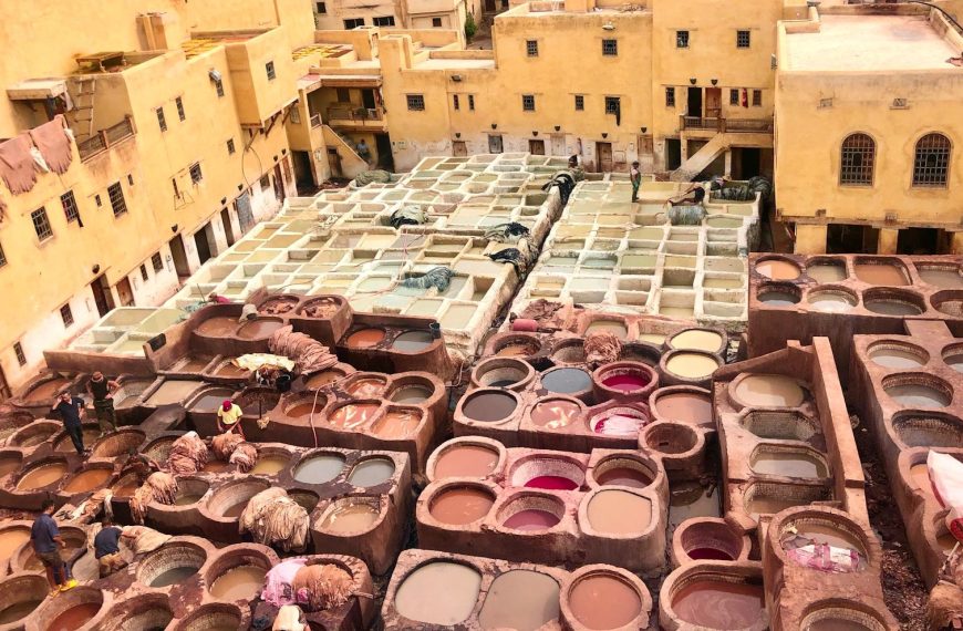 a group of clay pots sitting on top of a roof